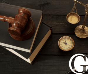 Gavel on law books next to justice scales