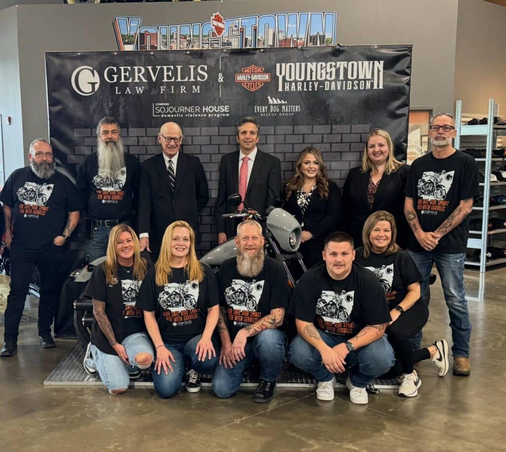 Gervelis team poses with Youngstown Harley Davidson staff