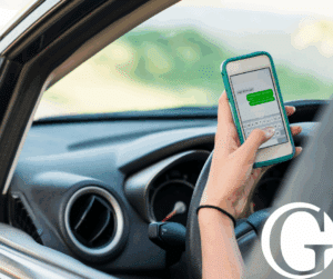 Person using their phone while driving